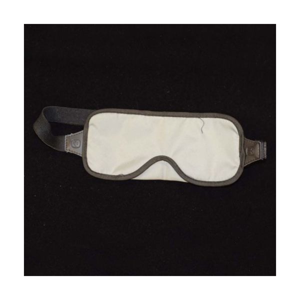 Black, satin, thinly padded eye mask on a black background.