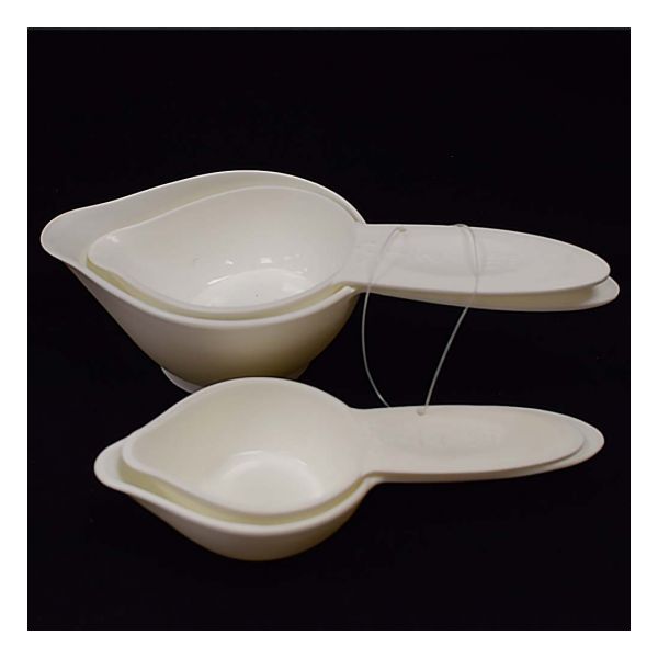 white plastic measuring cups 1/4, 1/3, 1/2, and 1 cup.